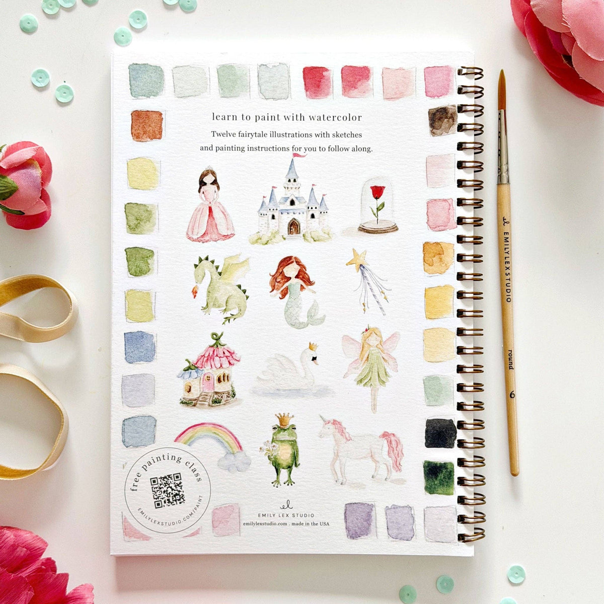Fairytale Watercolor Workbook by Emily Lex Studio — back cover showing all 12 fairytale illustrations: a princess in a pink gown, a white castle, an enchanted rose under a glass dome, a green dragon, a mermaid, a fairy with a wand, a fairy cottage, a swan, a garden fairy, a rainbow, a frog prince with crown, and a pink unicorn; pastel color swatch border; "learn to paint with watercolor" text at top; free painting class QR code at lower left; Emily Lex Studio logo at bottom