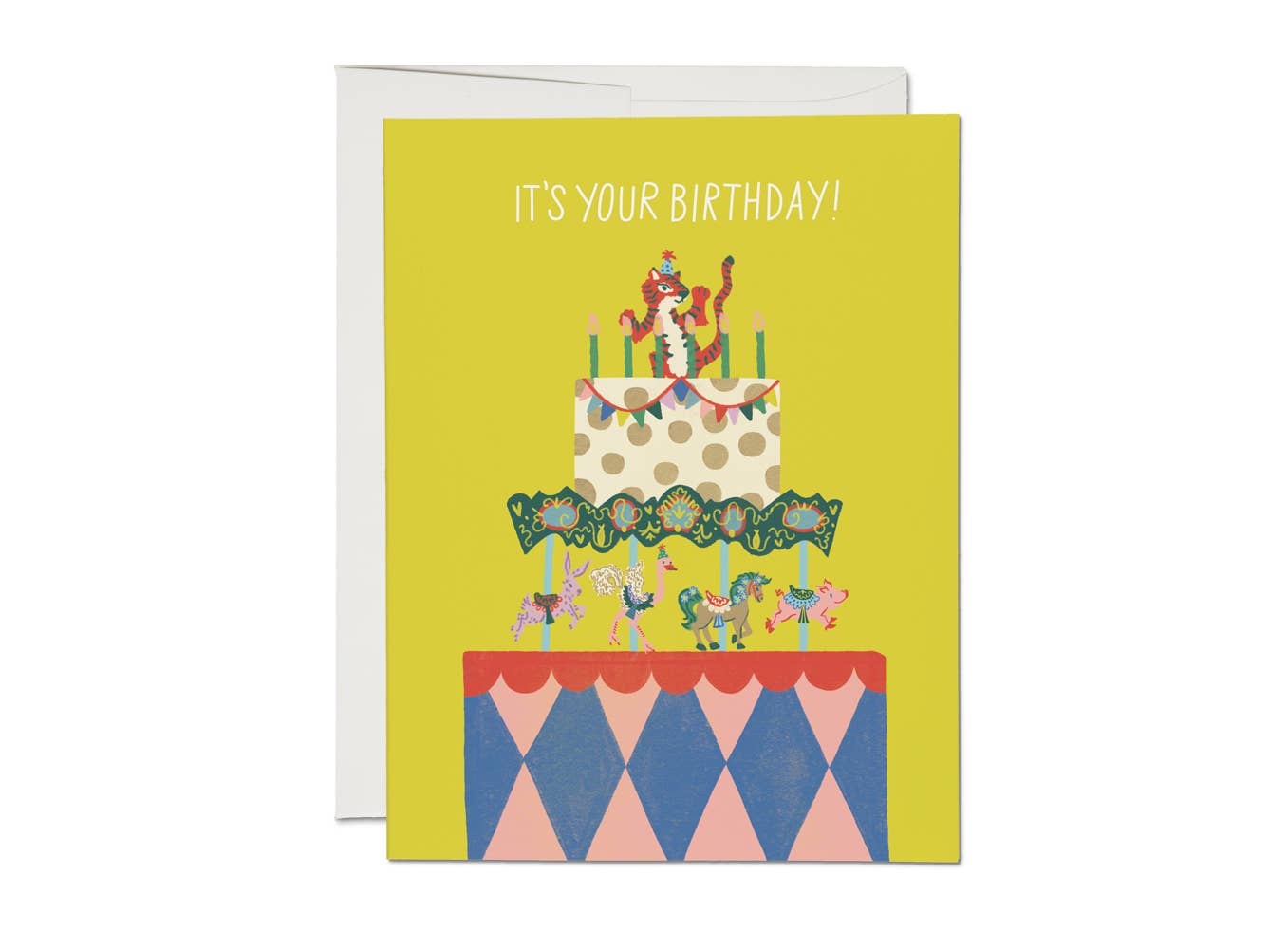 It's your birthday printed above a cake with an animal carousel beneath the cake. A fun tiger dancing on top of the cake.