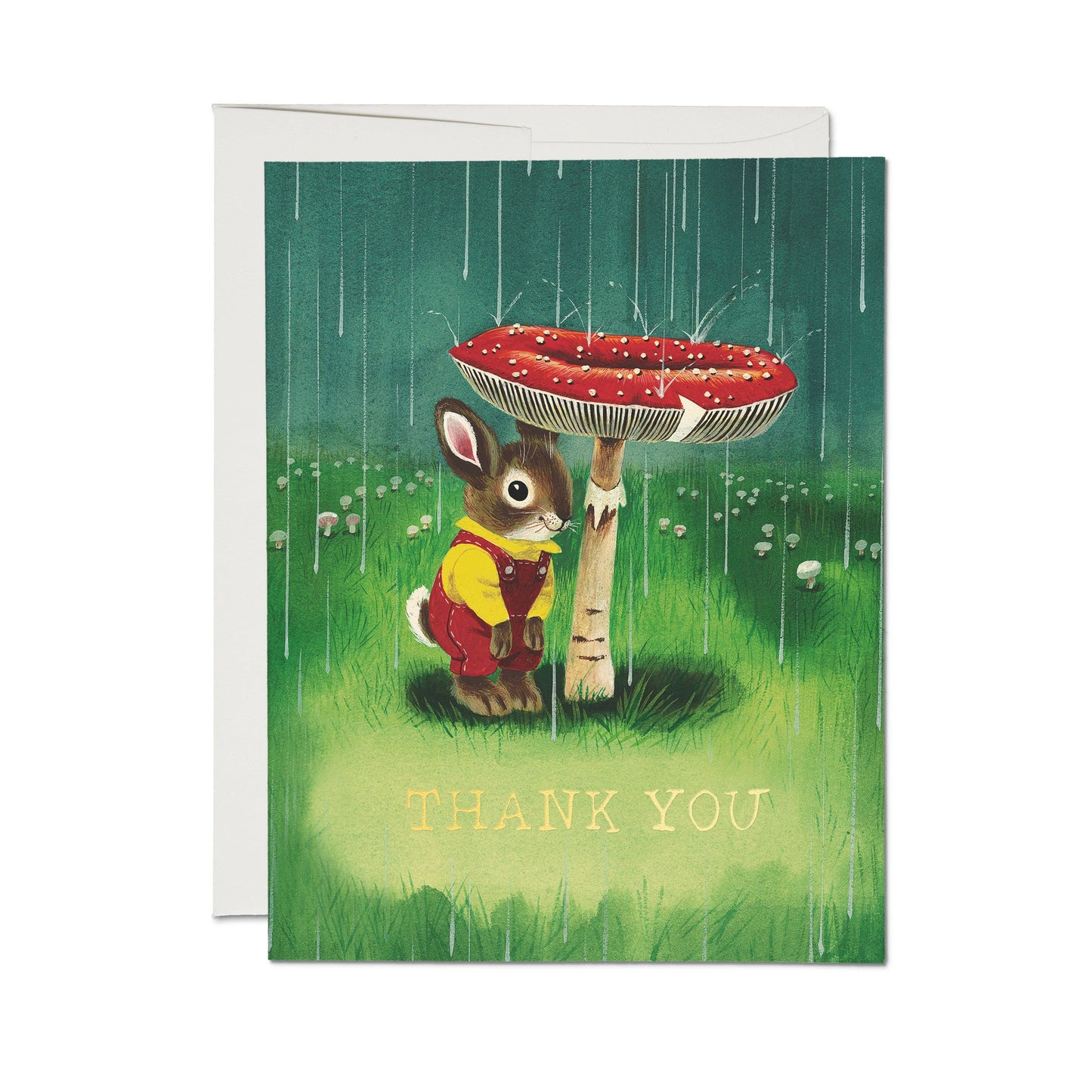 Red Cap Cards Richard Scarry Bunny and Mushroom Thank You Card — illustrated Richard Scarry bunny in yellow shirt and red overalls sheltering under a large red-spotted mushroom in the rain with foil-stamped "Thank You" on green background; white envelope shown behind; white background
