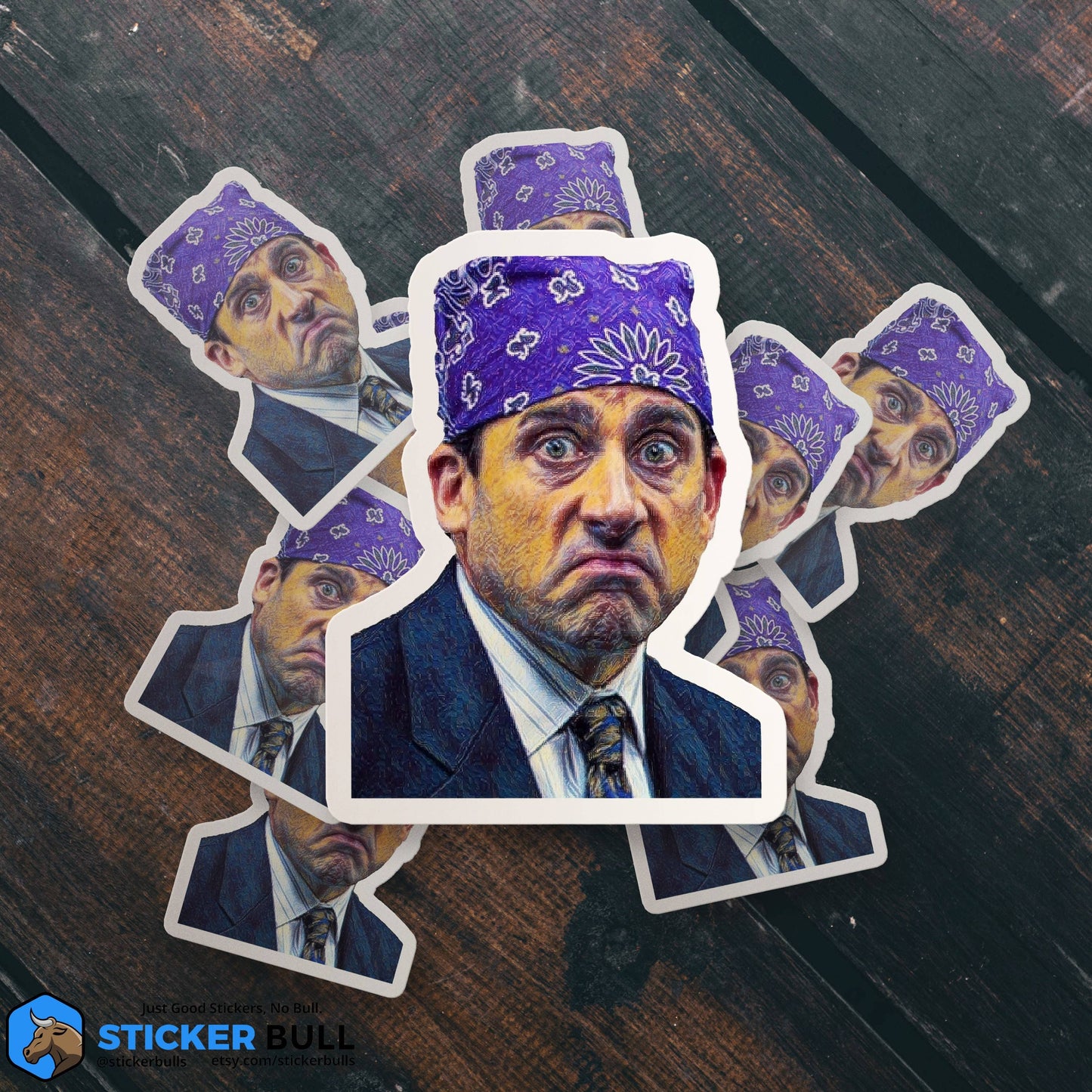 Multiple Sticker Bull Prison Mike The Office die cut vinyl stickers fanned out in a radial stack on a dark diagonal wood surface — illustrated Michael Scott as Prison Mike in purple bandana with stern expression; white die cut borders; Sticker Bull logo in corner
