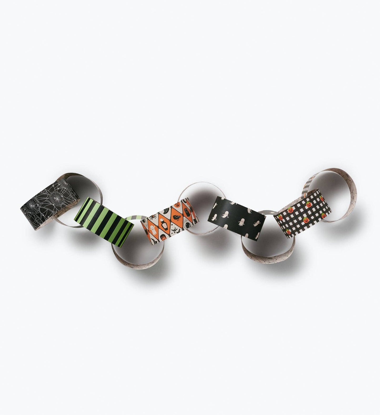Rifle Paper Co. Halloween Paper Chain Kit assembled — linked paper chain with spiderweb, green stripe, orange argyle with ghosts and spiders, floating ghosts on black, and black gingham with pumpkins patterns; white background