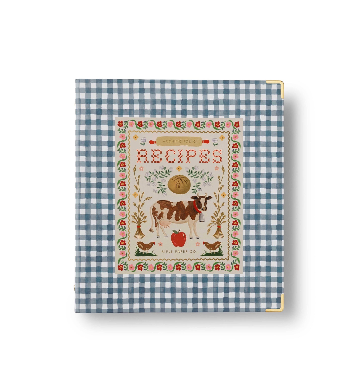 Rifle Paper Co. Home Sweet Home Recipe Binder front cover; blue gingham hardcover with gold corner accents; illustrated Recipes label featuring a cow, chickens, wheat sheaves, and florals; white background