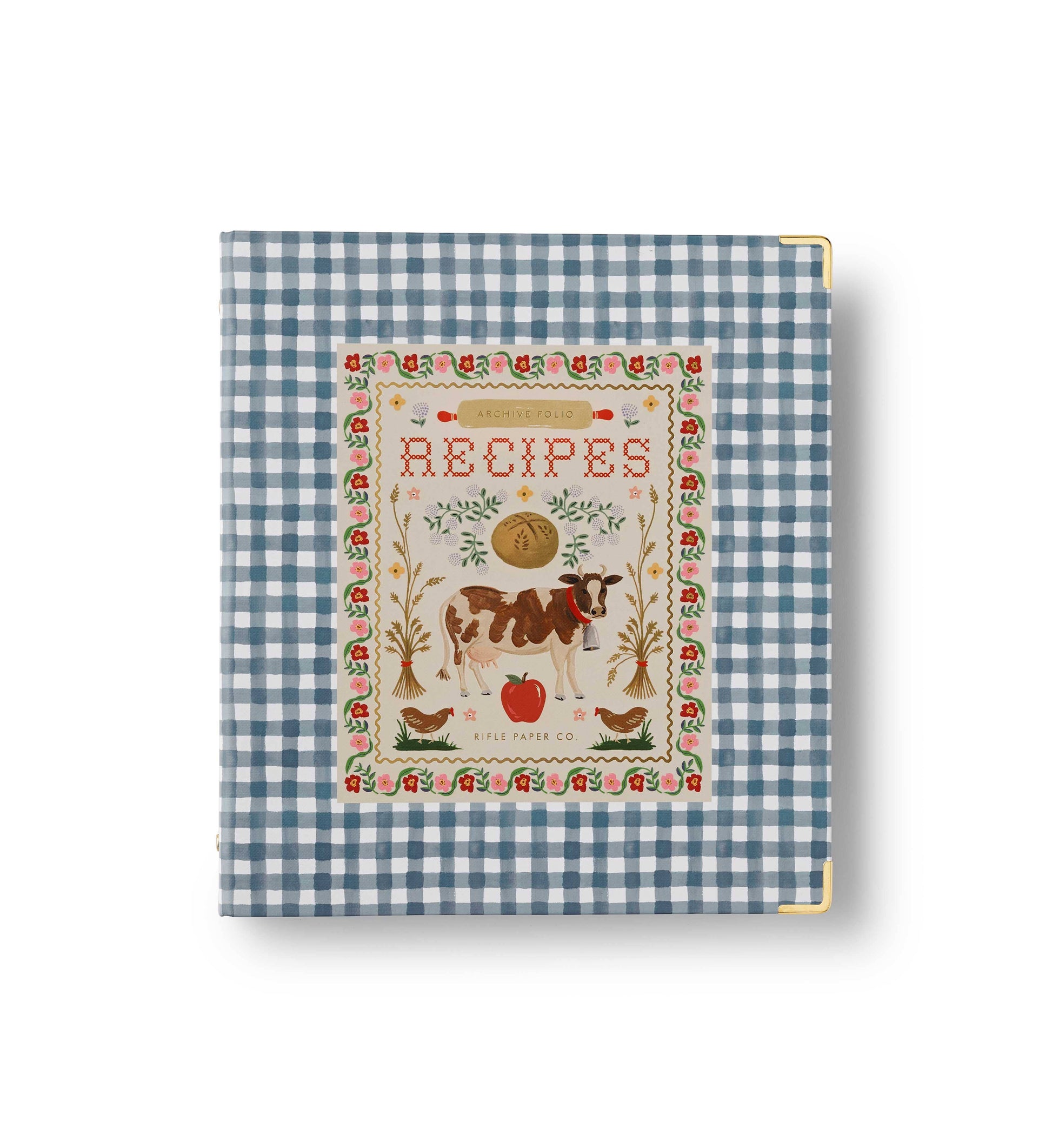 Rifle Paper Co. Home Sweet Home Recipe Binder front cover; blue gingham hardcover with gold corner accents; illustrated Recipes label featuring a cow, chickens, wheat sheaves, and florals; white background