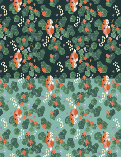 Two interior paper designs from Everything Is Made Out of Magic Stationery Pad — top half shows a dark teal background with a repeating pattern of sleeping orange foxes curled among round green leaves, orange flowers, dragonflies, and small mice; bottom half shows the same pattern on a sage green background