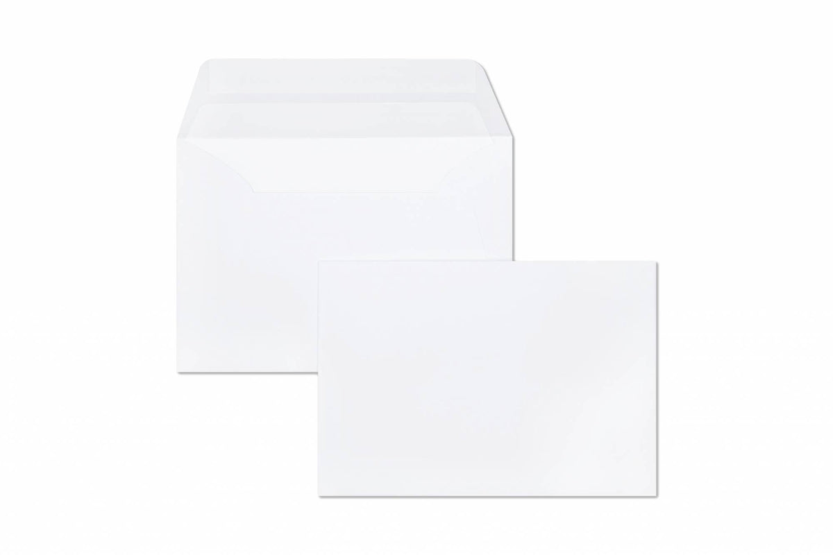 Two Clairefontaine Triomphe envelopes on white background — one envelope shown from back at angle revealing pointed gummed flap and bright white tissue-lined interior; second envelope shown face-up in foreground, super-white smooth front with no printing; both show clean square-ish A5 proportions
