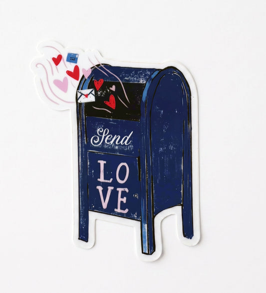 Made by Shellie City Mail Box with Hearts vinyl sticker — navy blue city mailbox with "Send" and "LOVE" in white script, overflowing with red and pink floating hearts and a love letter envelope; die-cut with white border; white background