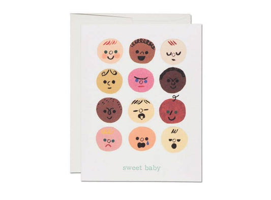 A2 baby card featuring 12 different babies with cute expressions and the words sweet baby below in light green. 